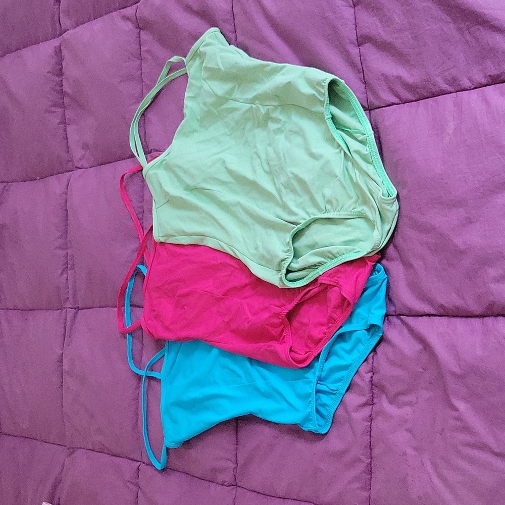 Natalie dancewear camisole leotards in hot pink and light green.